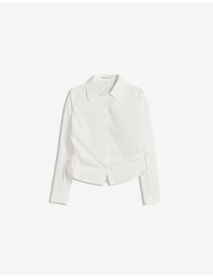 Yanı büzgülü, dar kesim gömlek