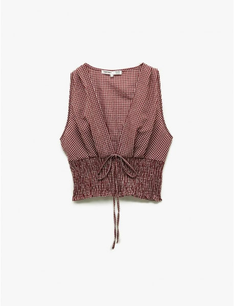 Koton X Melis Ağazat - Kolsuz V Yaka Fiyonklu Gipeli Pötikareli Kısa Bluz