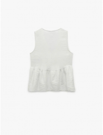 Koton X Melis Ağazat - Deniz Kabuğu Aksesuar Detaylı V Yaka Kolsuz Peplum Bluz