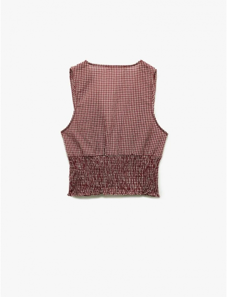 Koton X Melis Ağazat - Kolsuz V Yaka Fiyonklu Gipeli Pötikareli Kısa Bluz