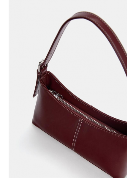 Dikiş detaylı kol çantası